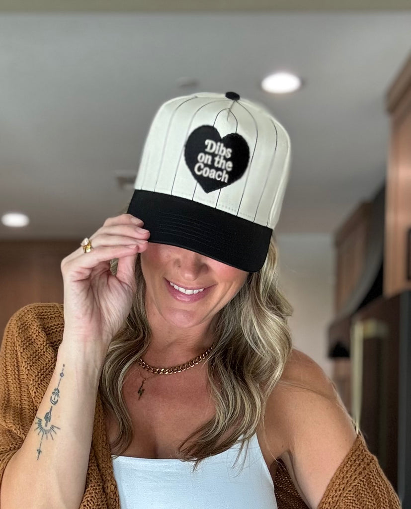 Dibs on the Coach Hat